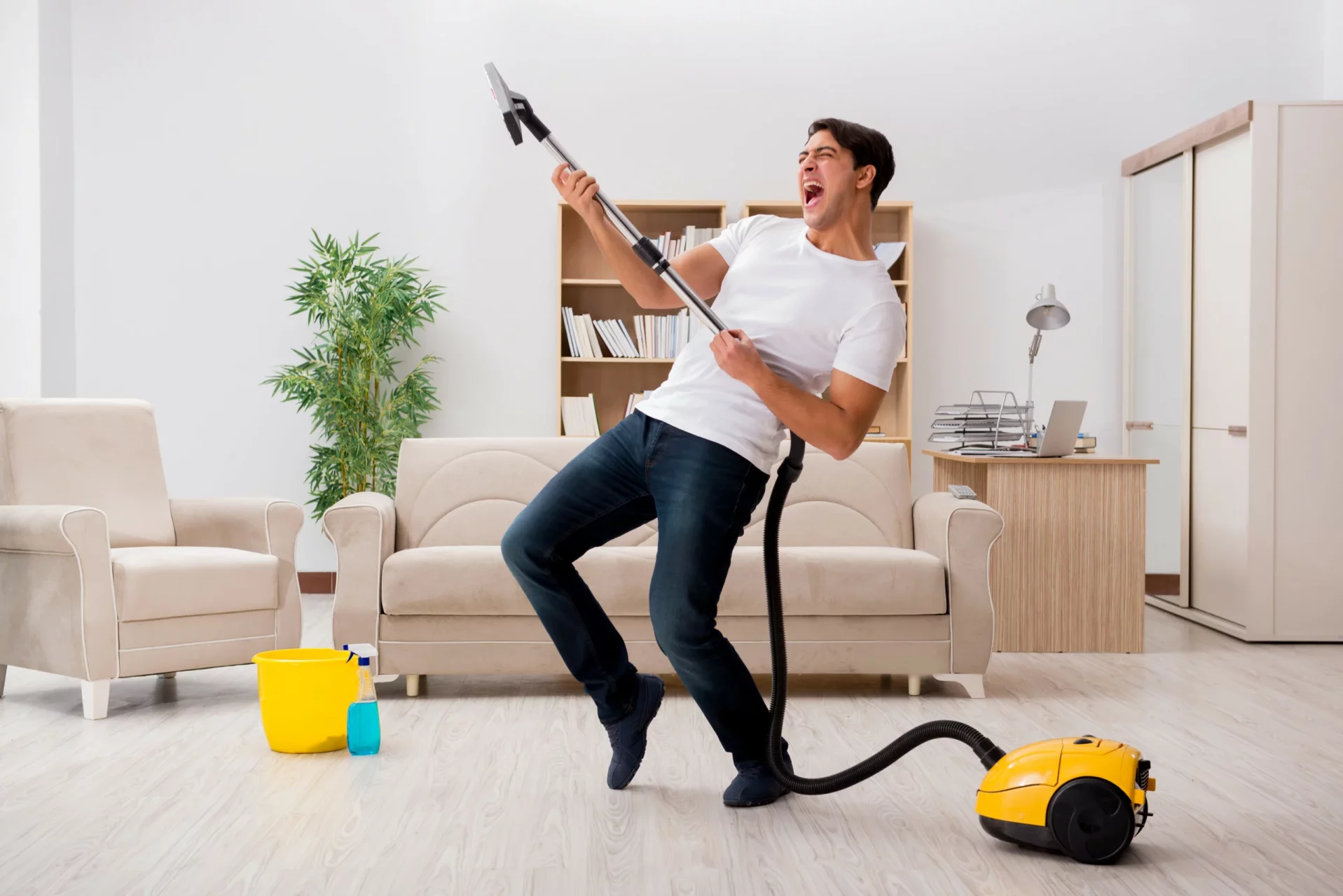 A man celebrates the amazing technical manual for his vacuum cleaner